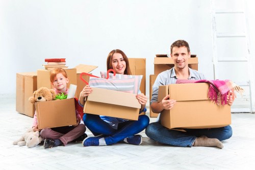 Professional movers handling furniture