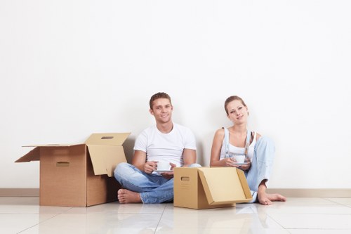 Professional movers handling furniture in Kingston