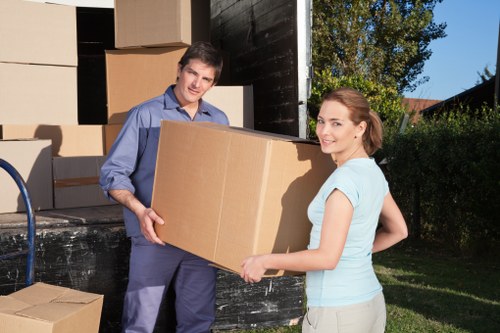 Experienced movers transporting items